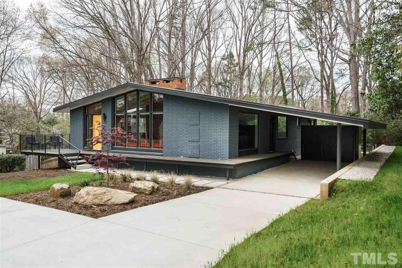 3322 Ocotea Street Raleigh, NC 27607 - Photo 25 of 25 a front view of a house with garden