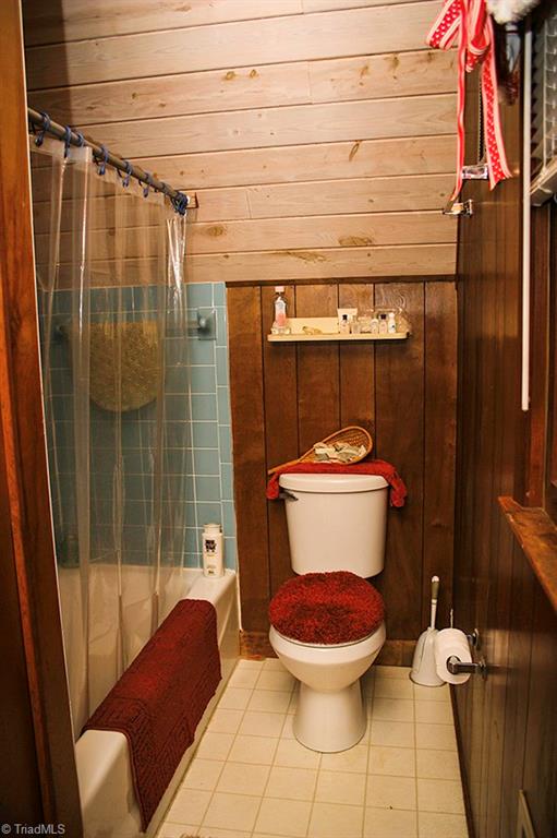 47 Ridge Road Glade Valley, NC 28627 - Photo 13 of 25 Another view of the master bath showing the full sized tub shower.
