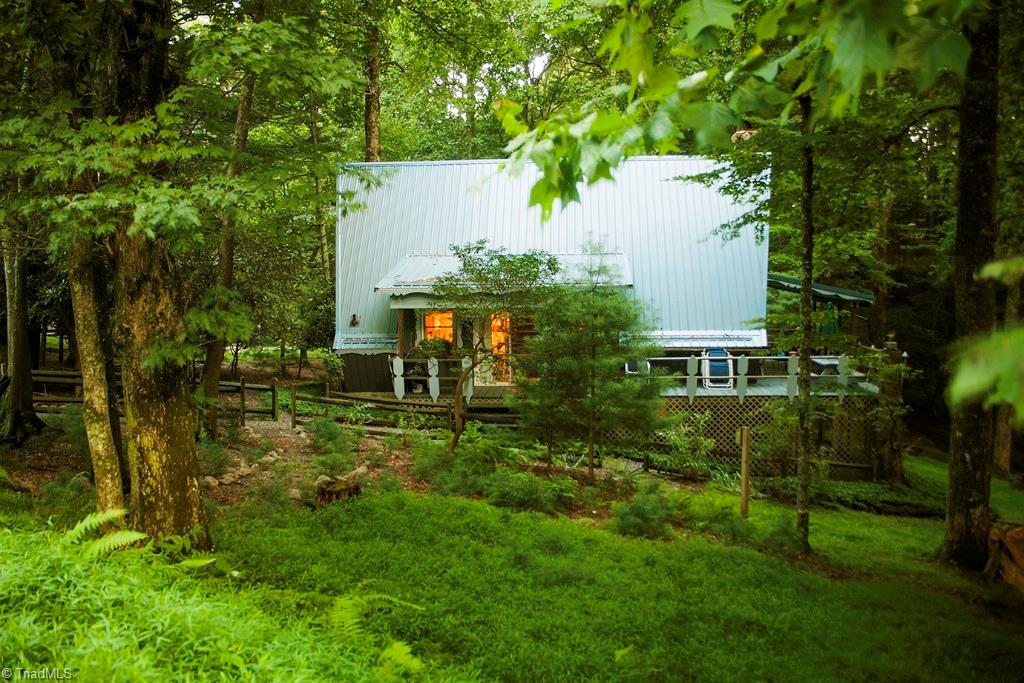 47 Ridge Road Glade Valley, NC 28627 - Photo 17 of 25 This home as seen from the road. What a welcoming sight for your guests!