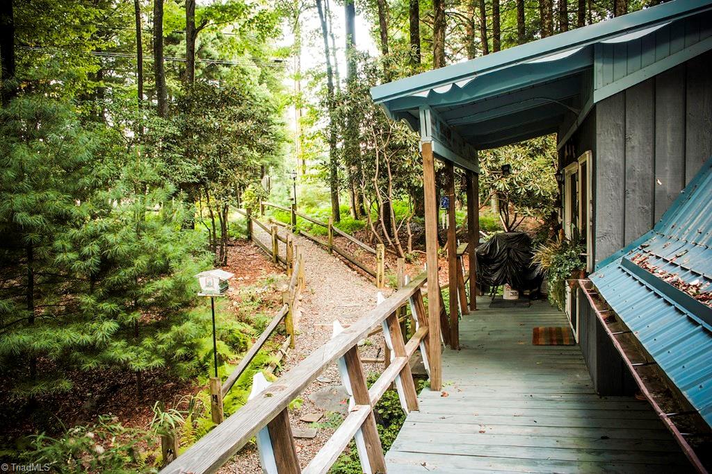 47 Ridge Road Glade Valley, NC 28627 - Photo 22 of 25 Picture your family and guests greeting you as the come down the walkway to your deck.