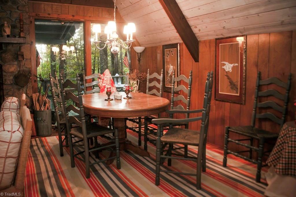 47 Ridge Road Glade Valley, NC 28627 - Photo 7 of 25 Another view of the dining area. Notice the big picture window so you can enjoy the view during dinner!