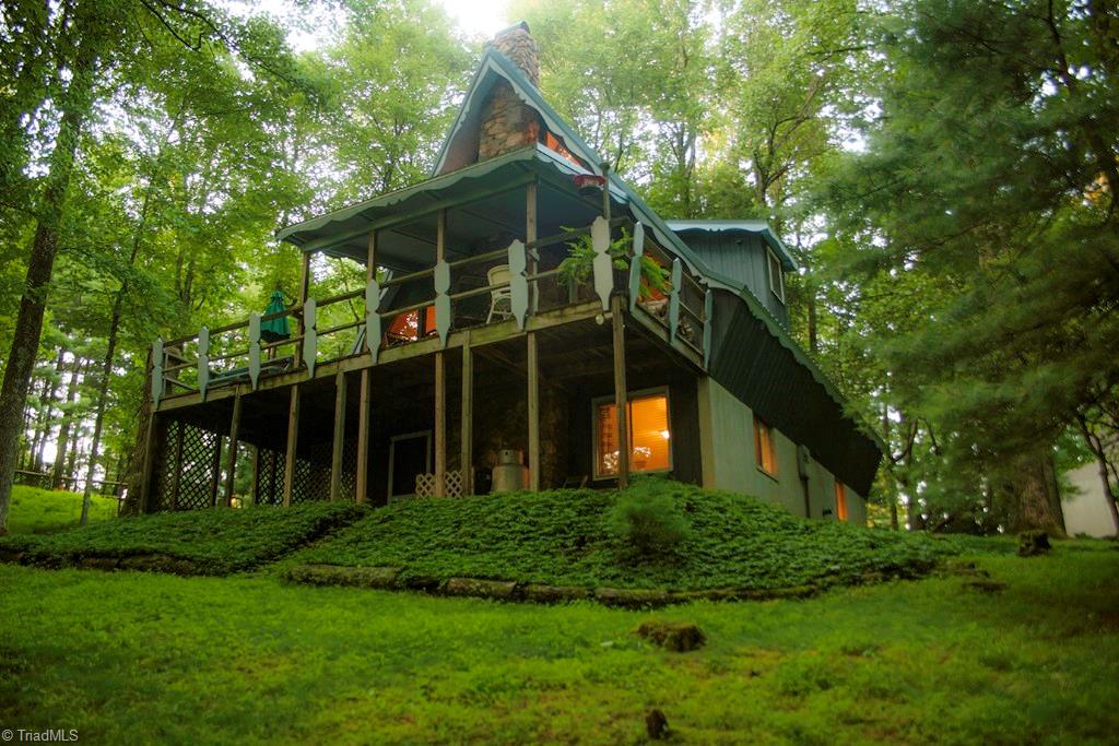 47 Ridge Road Glade Valley, NC 28627 - Photo 8 of 25 Another view from the rear yard. It's as if you have your own private mountain retreat, yet you are in a wonderfully safe and quiet neighborhood.