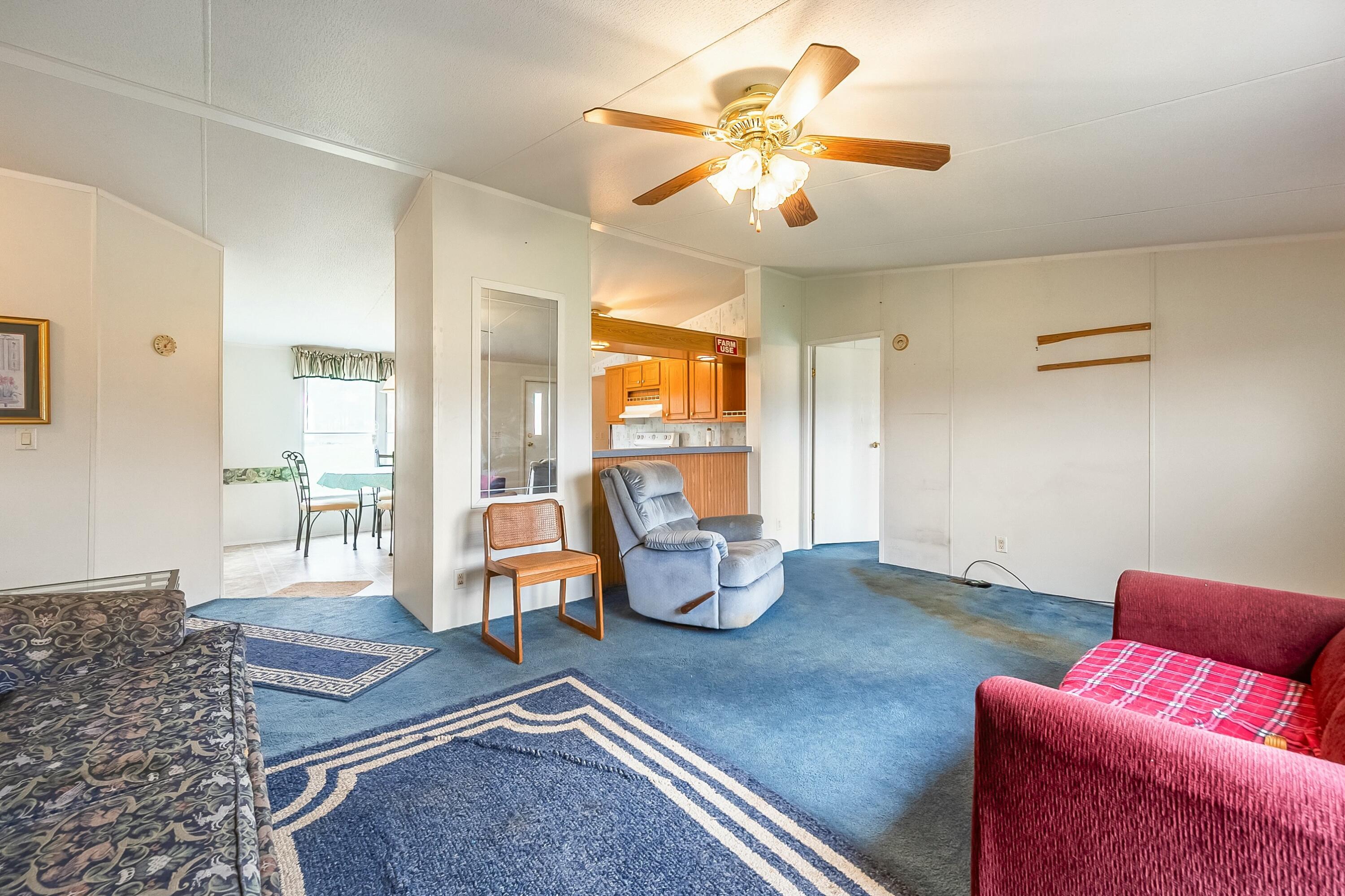 3588 Flatwoods Road Elliston, VA 24087 - Photo 13 of 119 a living room with furniture and wooden floor