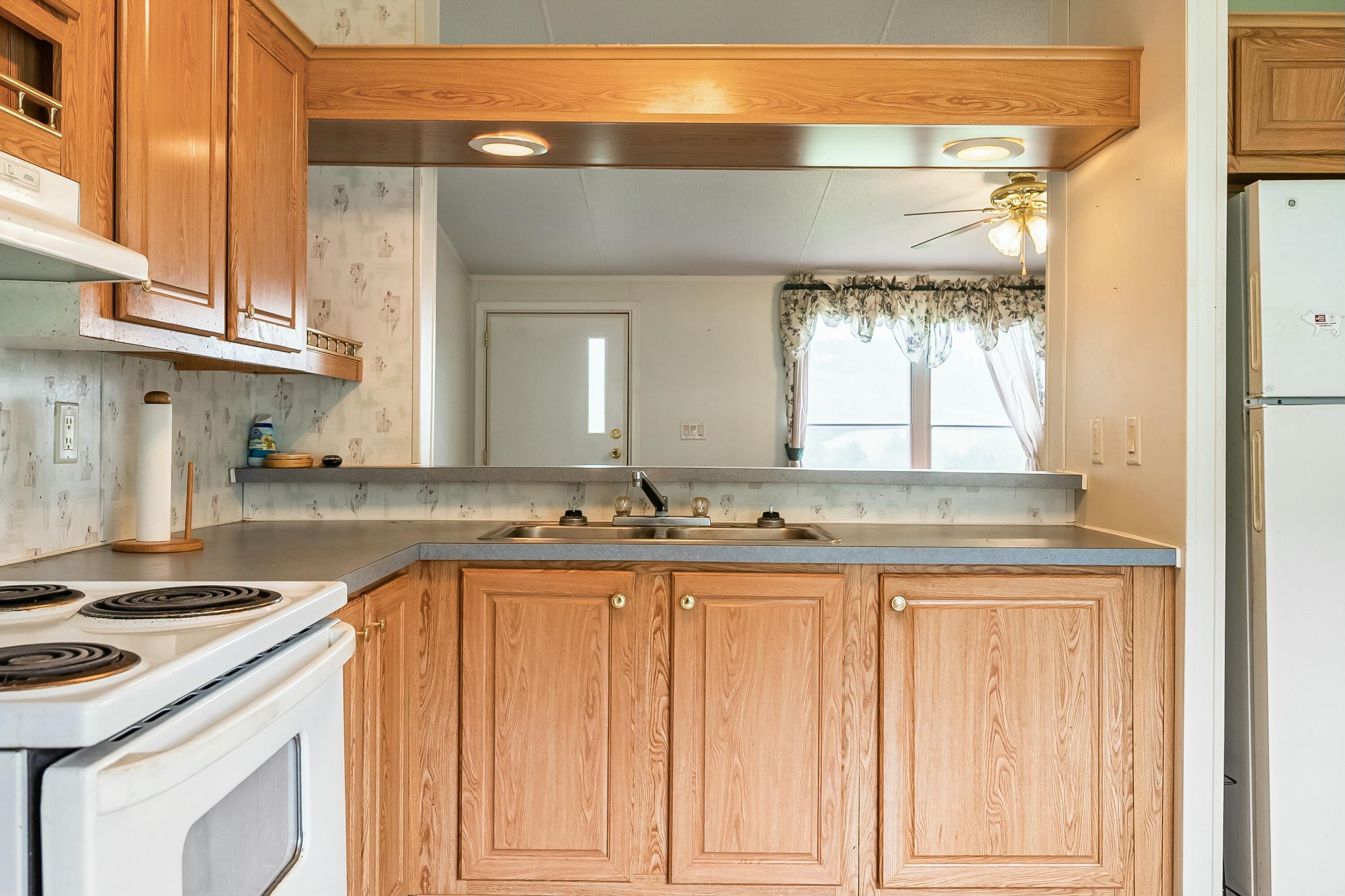 3588 Flatwoods Road Elliston, VA 24087 - Photo 20 of 119 a kitchen with a sink and cabinets