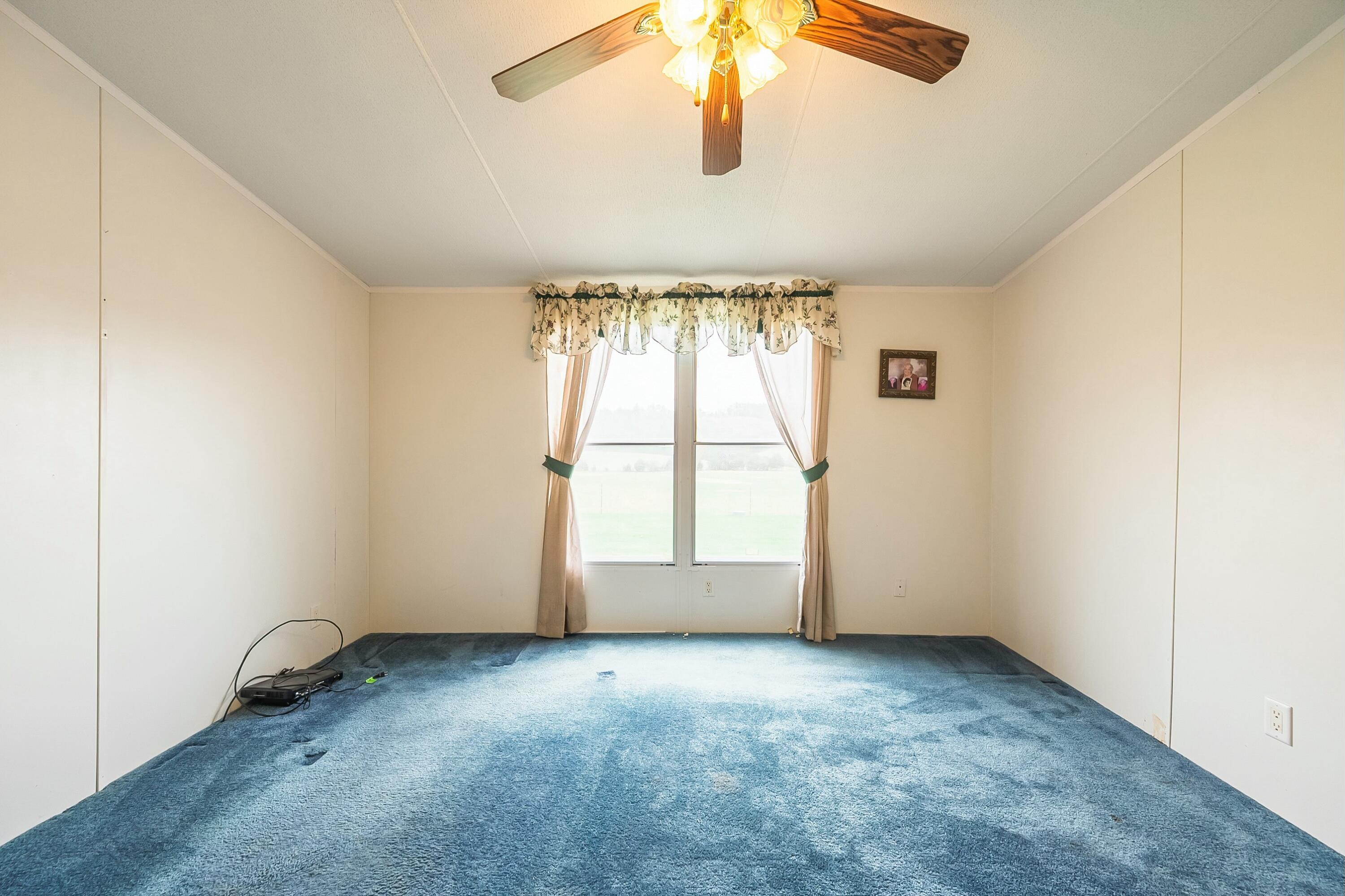 3588 Flatwoods Road Elliston, VA 24087 - Photo 34 of 119 an empty room with a window