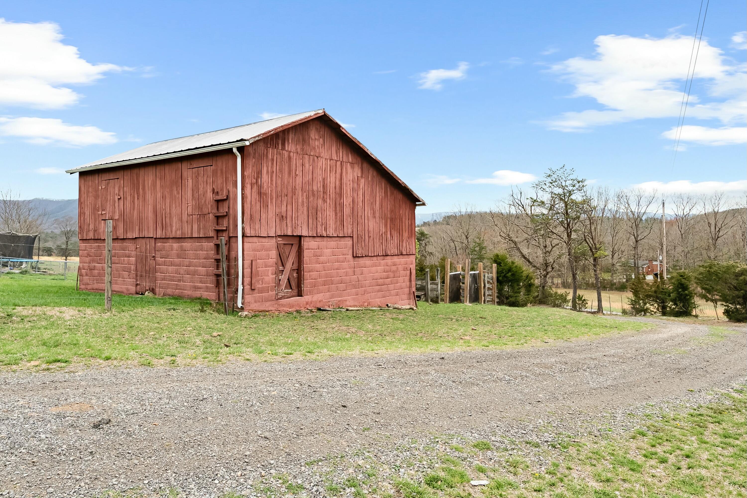 3588 Flatwoods Road Elliston, VA 24087 - Photo 46 of 119 a view of a backyard with wooden fence