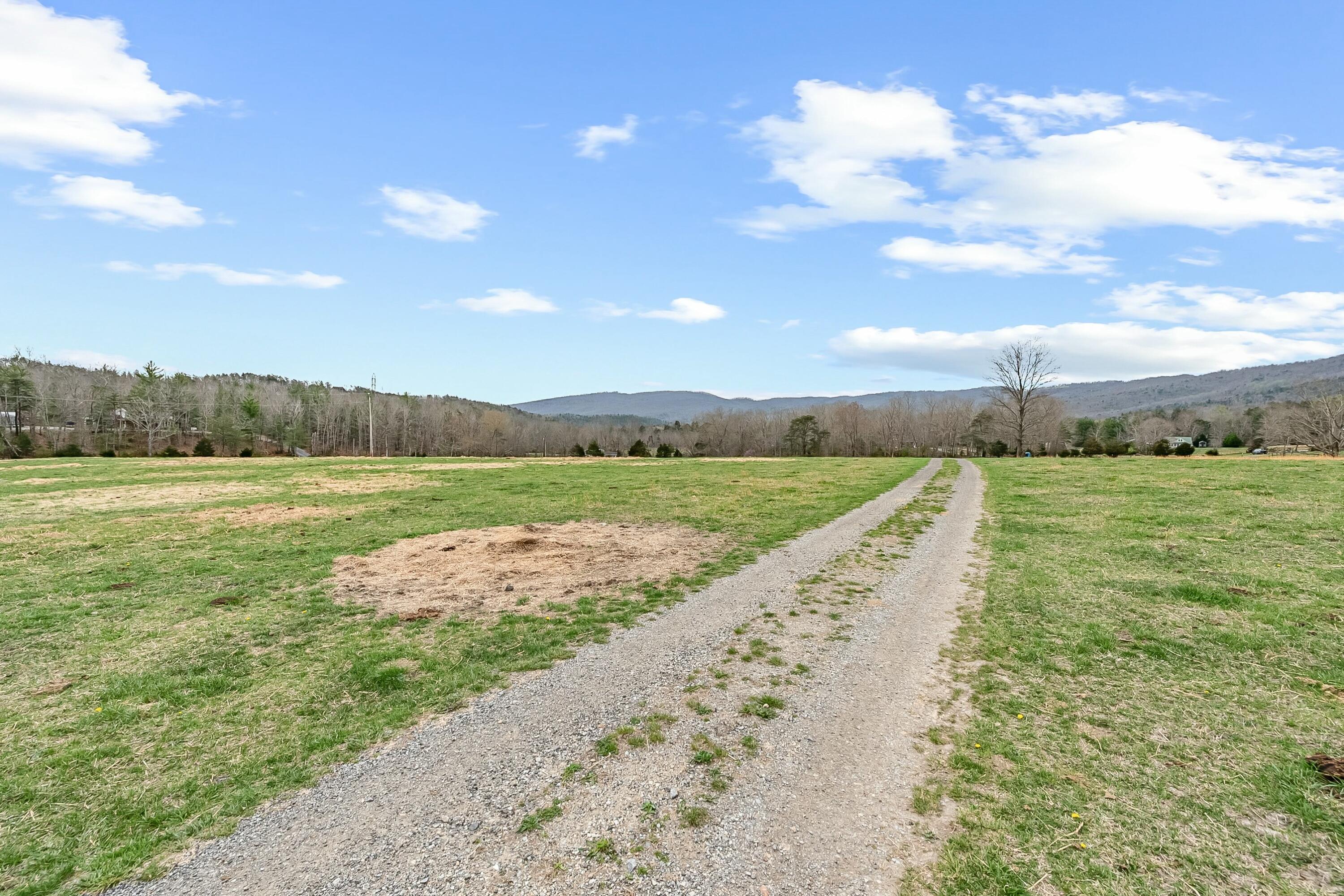 3588 Flatwoods Road Elliston, VA 24087 - Photo 63 of 119 a view of a lake with a yard