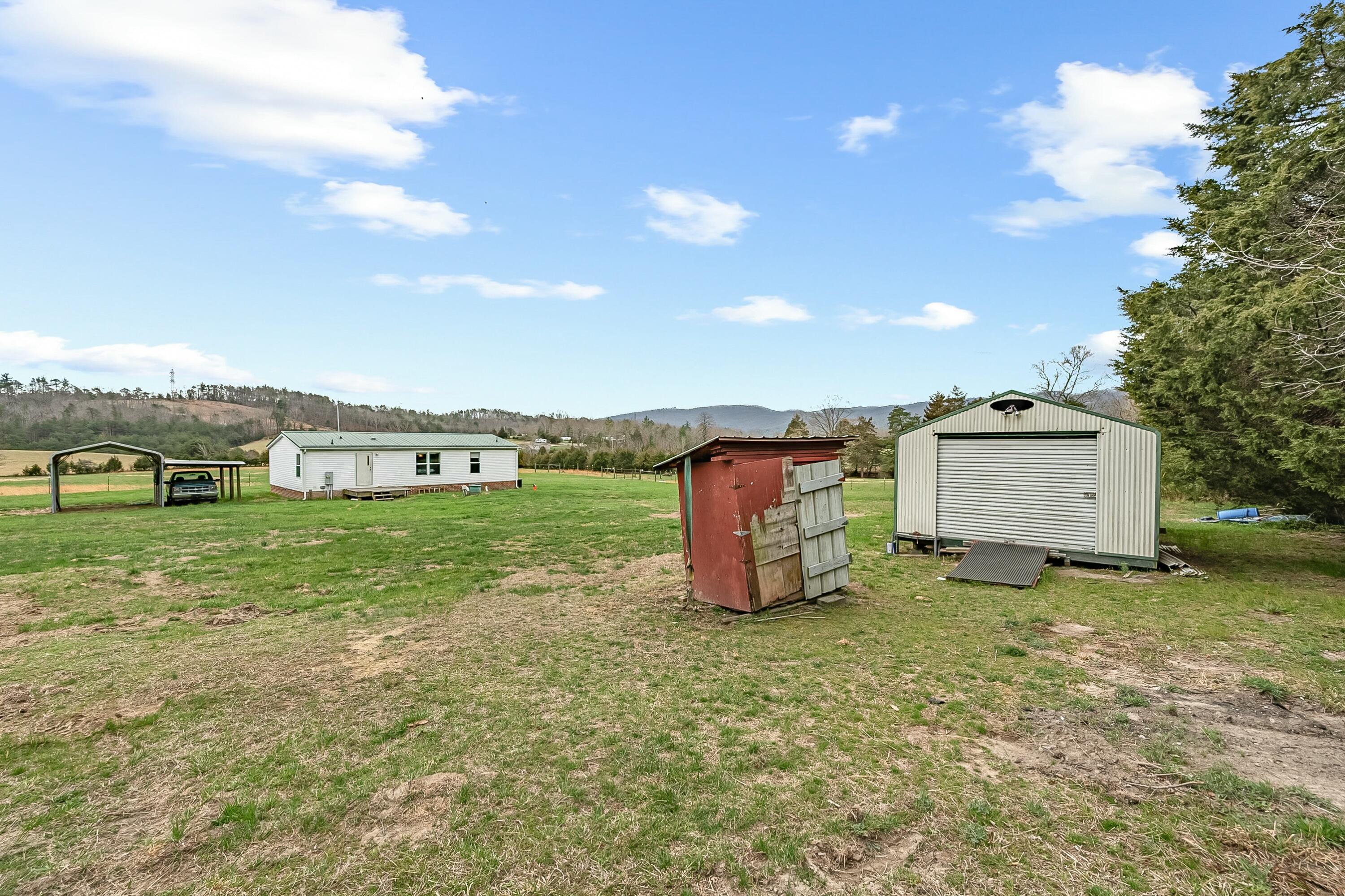 3588 Flatwoods Road Elliston, VA 24087 - Photo 86 of 119 a house view with a garden space