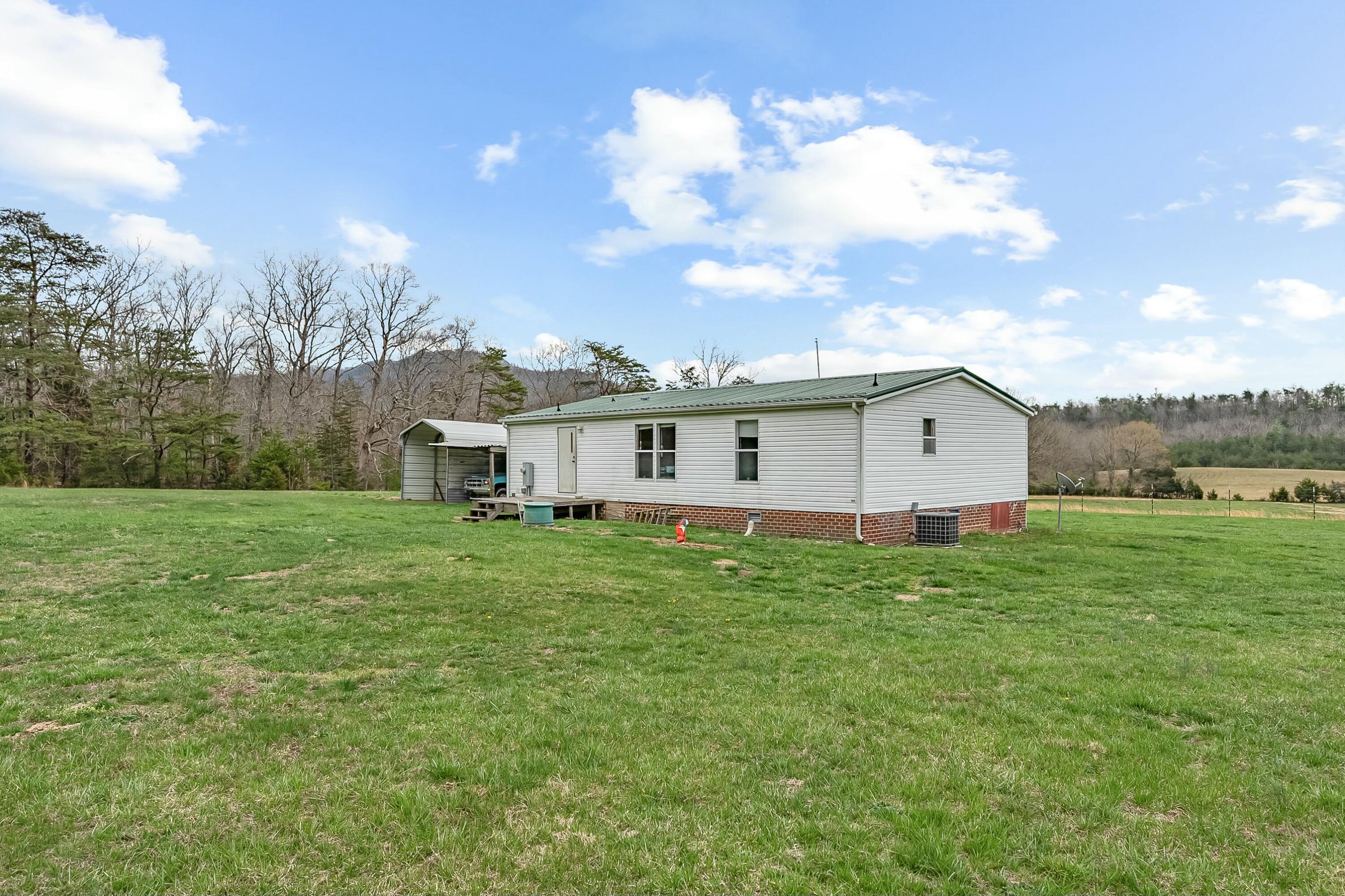 3588 Flatwoods Road Elliston, VA 24087 - Photo 88 of 119 a view of a house with a big yard