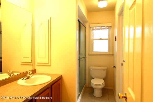 8 Patmore Road Brick, NJ 08724 - Photo 8 of 10 a bathroom with a granite countertop sink toilet and shower
