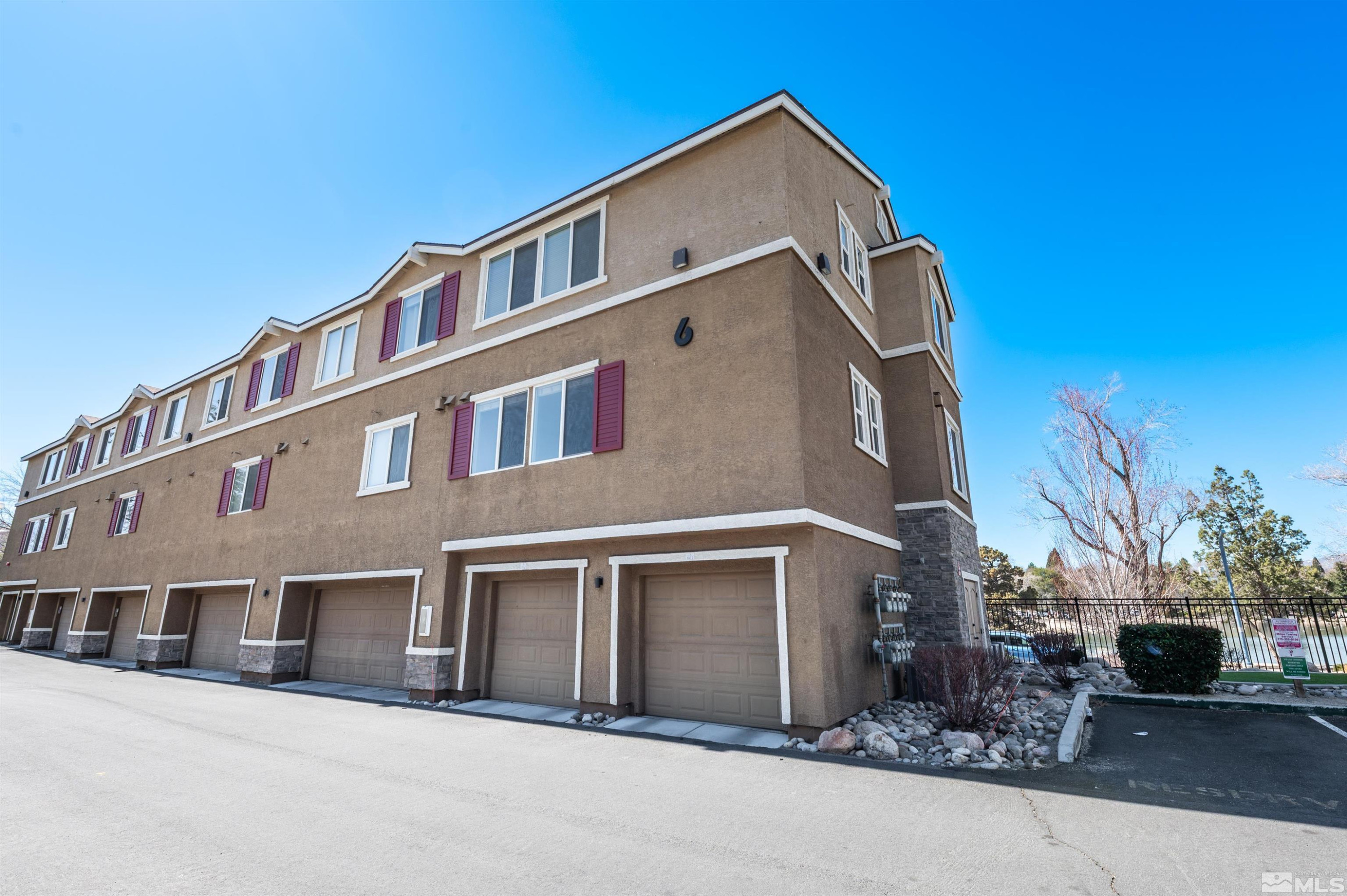 2490 Eastshore Place, Unit 602 Reno, NV 89509 - Photo 27 of 36 a front view of a house with yard