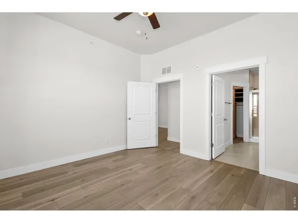 a living room with fireplace furniture and a chandelier