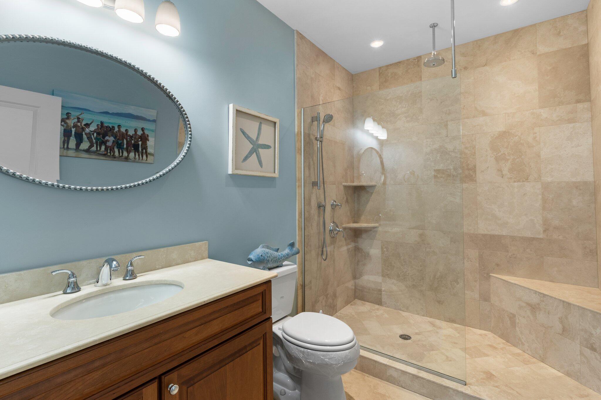 16 Quinns Way Mashpee, MA 02649 - Photo 17 of 59 a bathroom with a sink toilet and a mirror