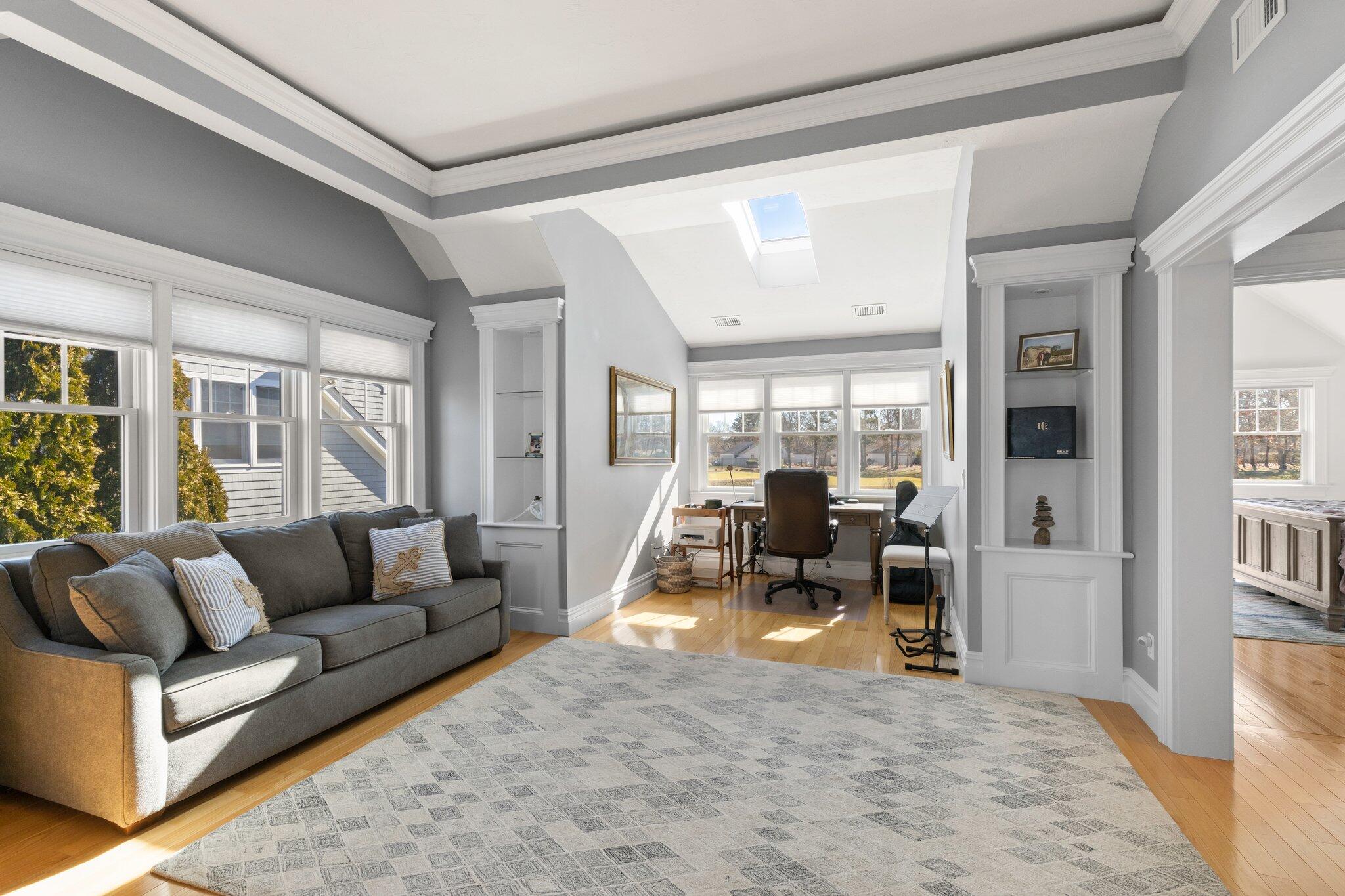 16 Quinns Way Mashpee, MA 02649 - Photo 20 of 59 a living room with furniture floor to ceiling window and couch