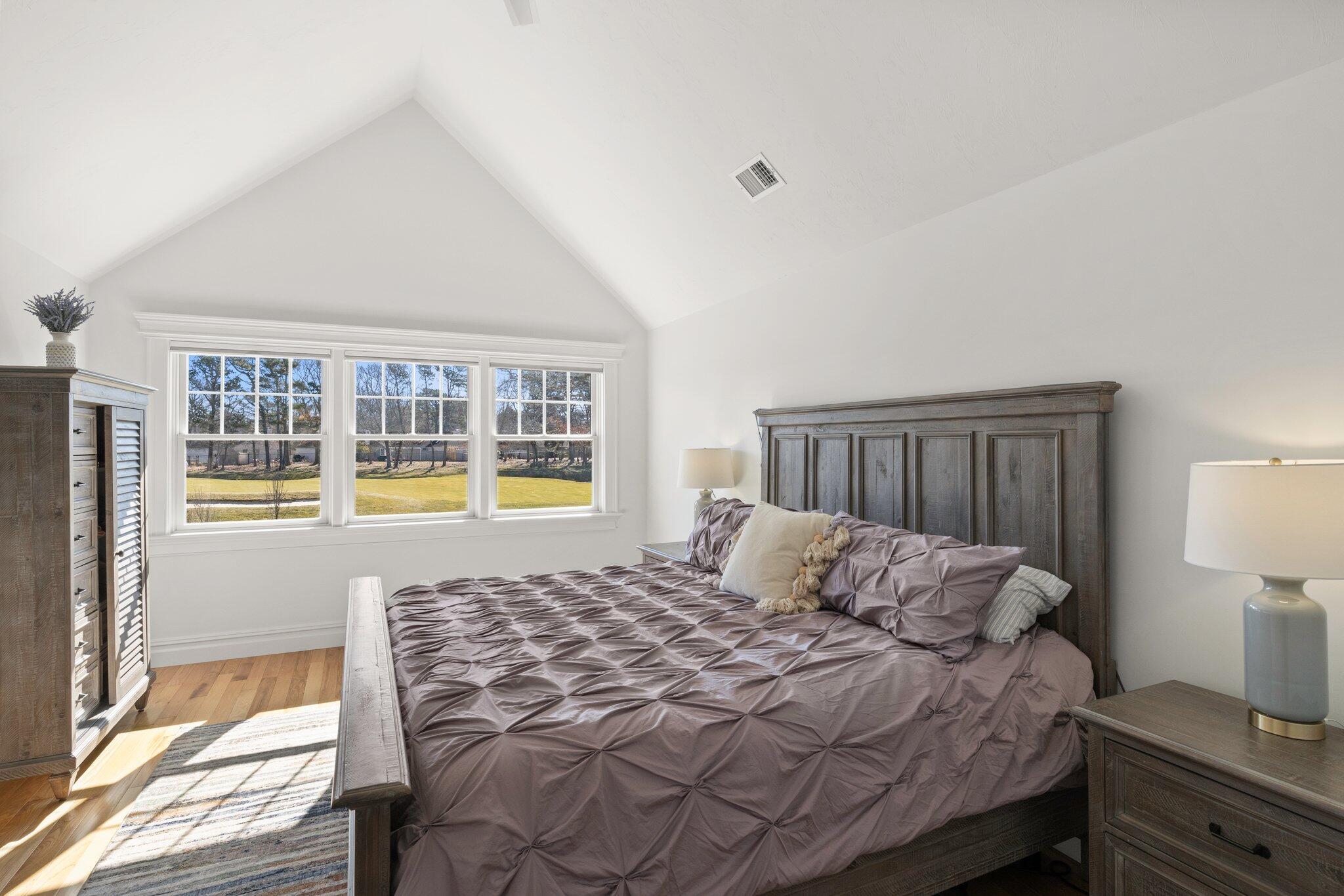 16 Quinns Way Mashpee, MA 02649 - Photo 23 of 59 a bedroom with a large bed and a window