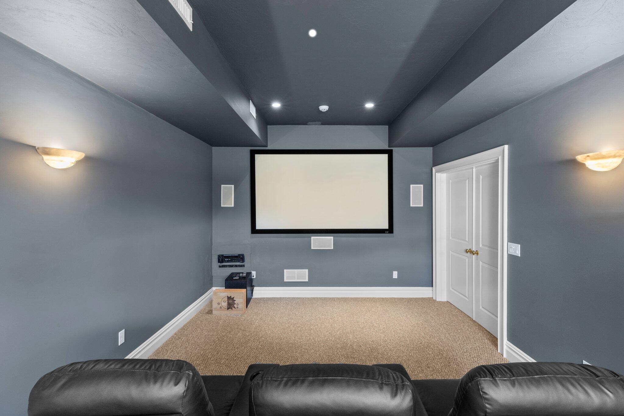 16 Quinns Way Mashpee, MA 02649 - Photo 30 of 59 a room with furniture and a projector screen