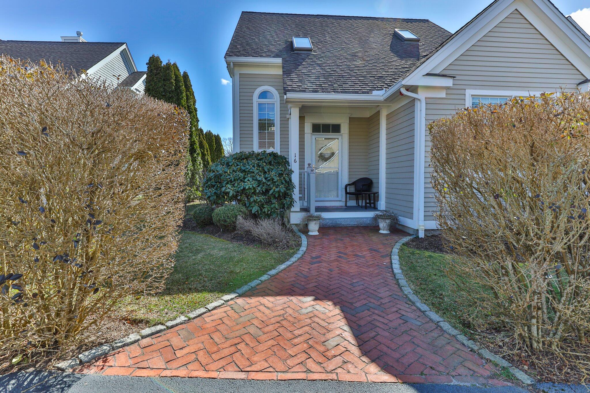 16 Quinns Way Mashpee, MA 02649 - Photo 31 of 59 front view of a house with a yard