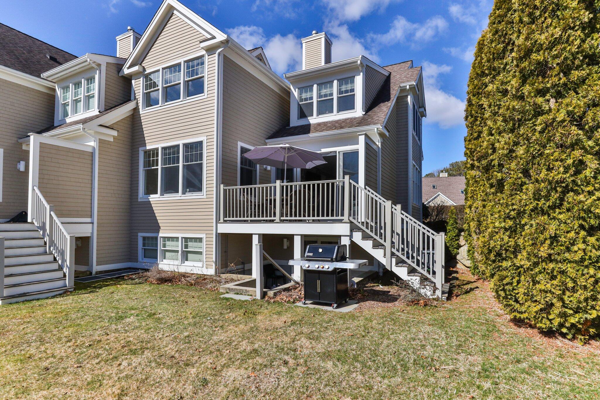16 Quinns Way Mashpee, MA 02649 - Photo 36 of 59 front view of a house with a small yard