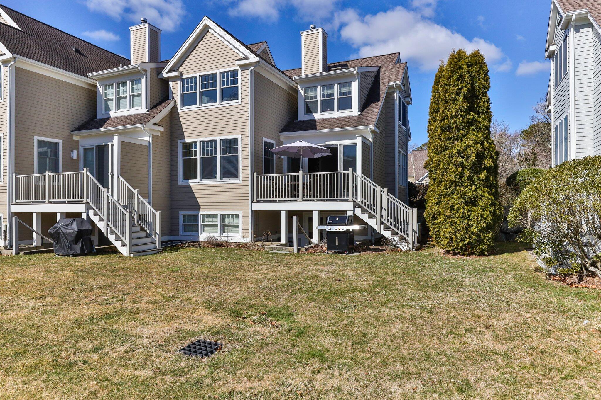 16 Quinns Way Mashpee, MA 02649 - Photo 37 of 59 a view of a large white building