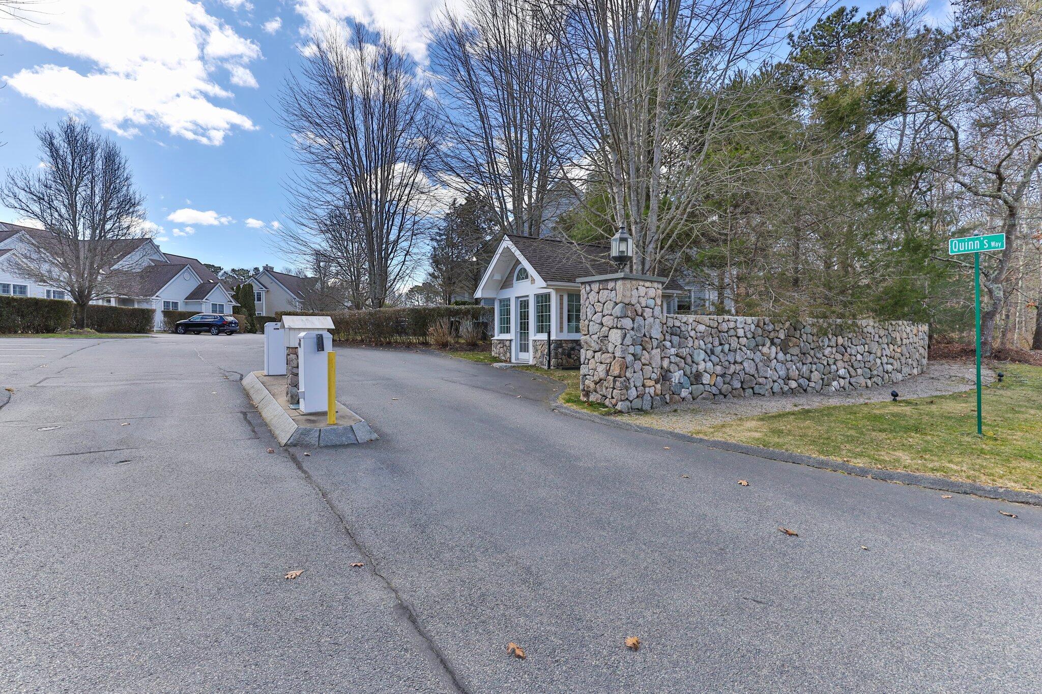 16 Quinns Way Mashpee, MA 02649 - Photo 39 of 59 a view of road with large trees