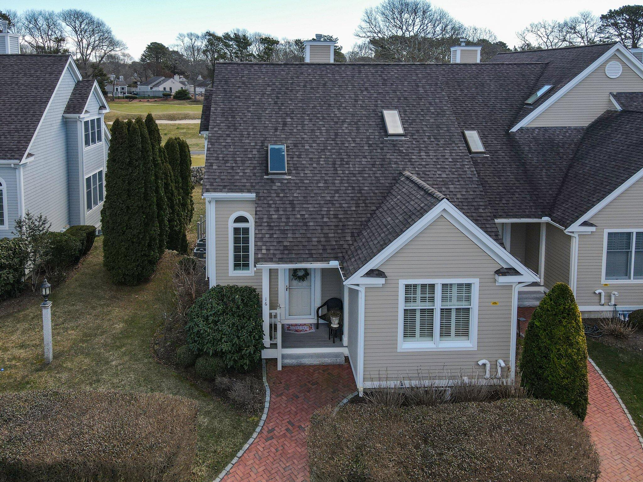 16 Quinns Way Mashpee, MA 02649 - Photo 40 of 59 a front view of a house with a yard