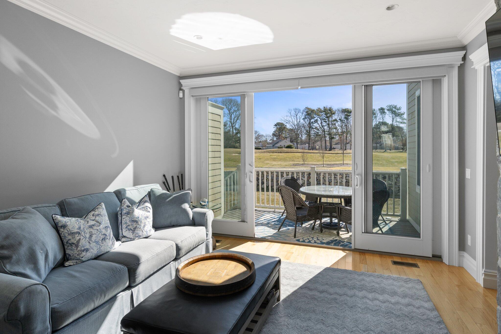 16 Quinns Way Mashpee, MA 02649 - Photo 4 of 59 a living room with furniture and a fireplace