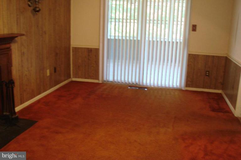 2326 Archdale Road Reston, VA 20191 - Photo 6 of 8 a view of a room with a wooden floor