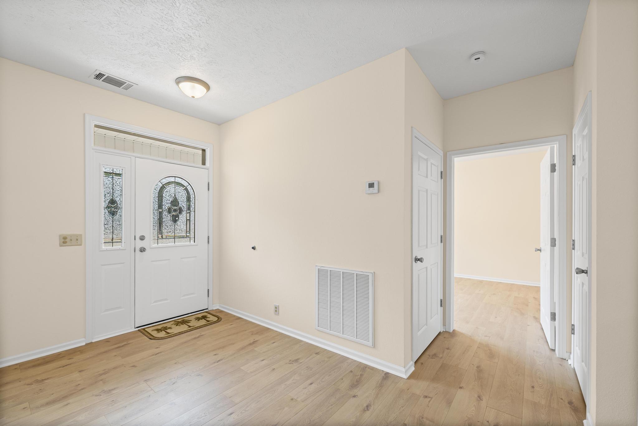 3159 Forrest Avenue Crestview, FL 32539 - Photo 20 of 41 a view of a livingroom with wooden floor