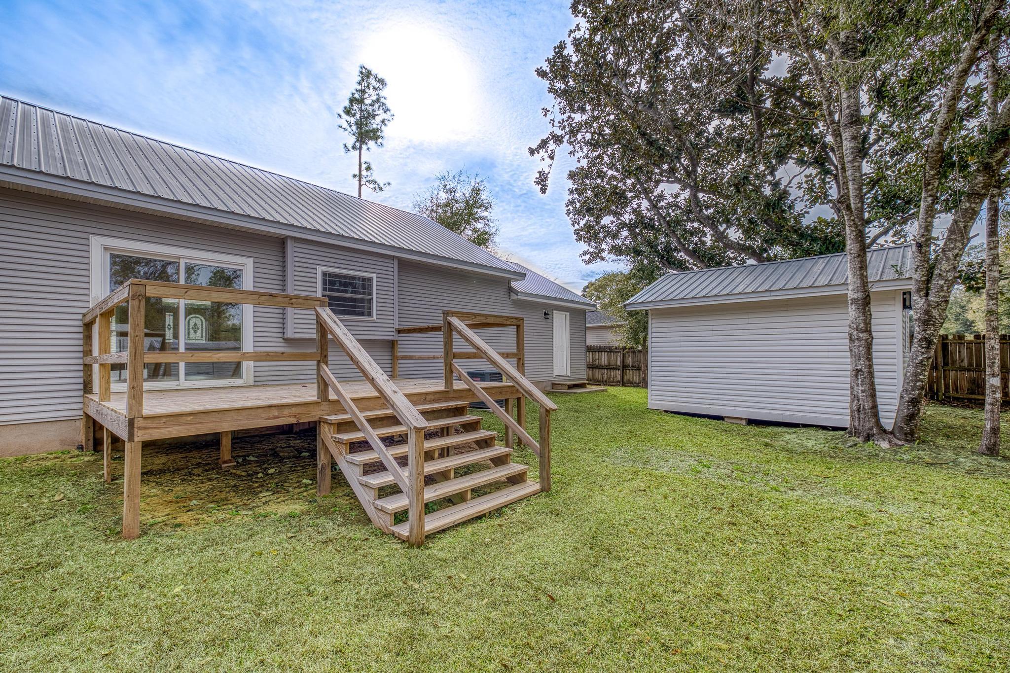 3159 Forrest Avenue Crestview, FL 32539 - Photo 35 of 41 a house view with a backyard space