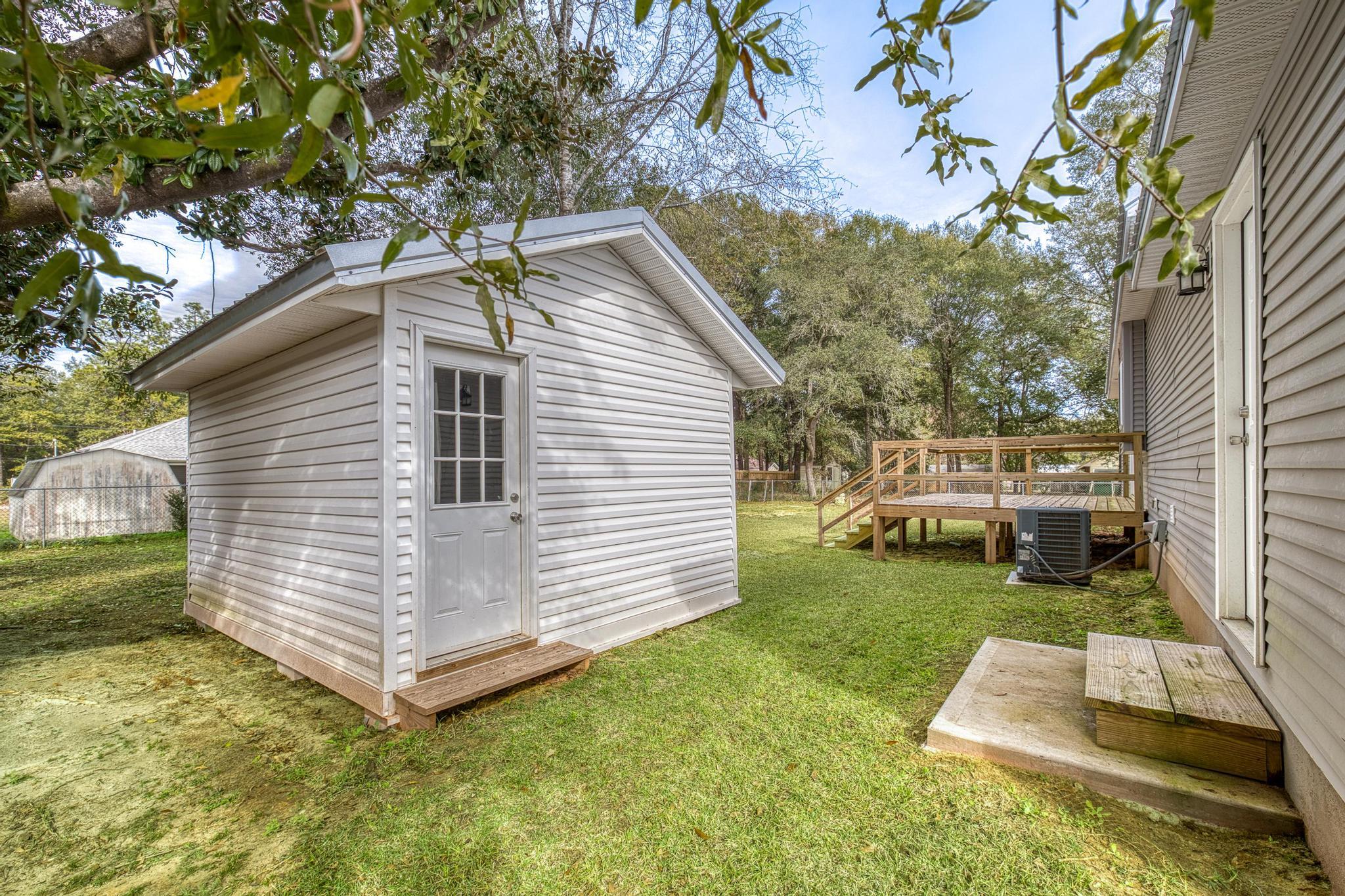 3159 Forrest Avenue Crestview, FL 32539 - Photo 36 of 41 a view of a house with a yard