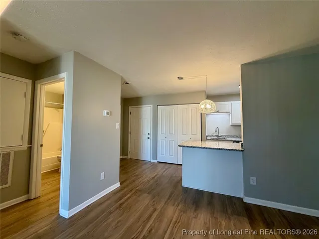 a view of a bathroom from the hallway
