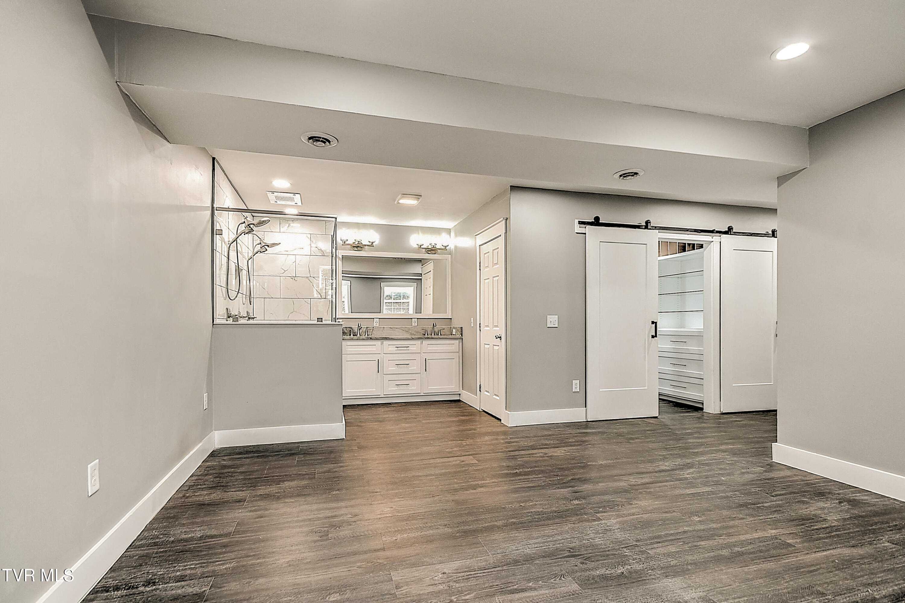 318 Webb Road Piney Flats, TN 37686 - Photo 26 of 45 Downstairs Master Bedroom to Master Bath