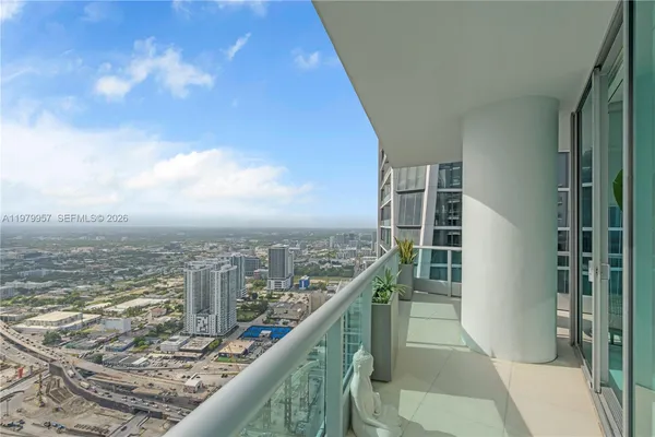 a view of a balcony with an ocean view