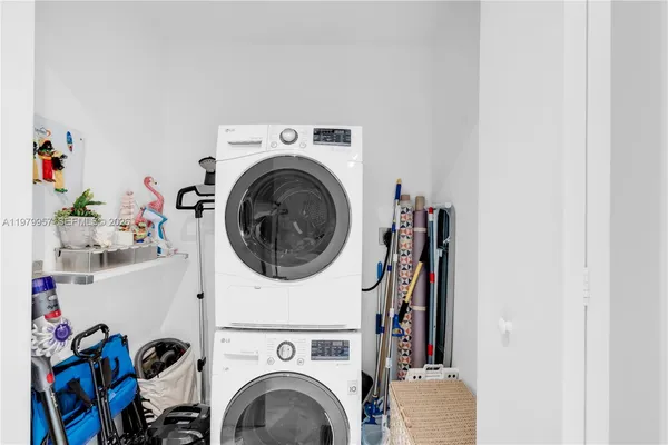 a view of livingroom with washer and dryer