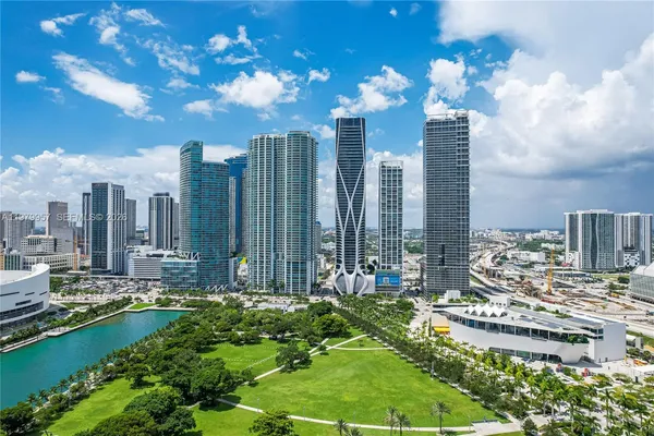 a view of a city with tall buildings