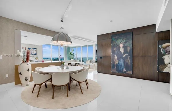 a view of a dining room with furniture