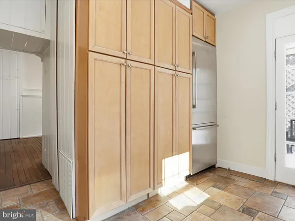 a view of a closet area with empty room