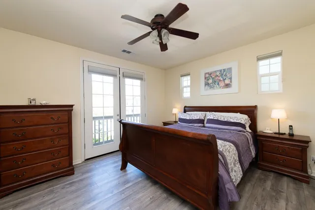 a bed room with a bed and a window