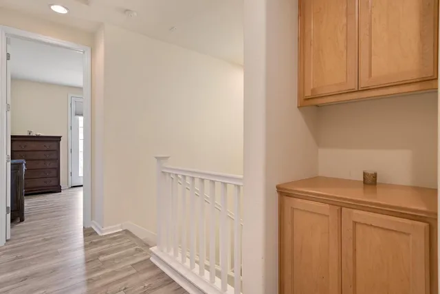 a view of entryway with wooden floor