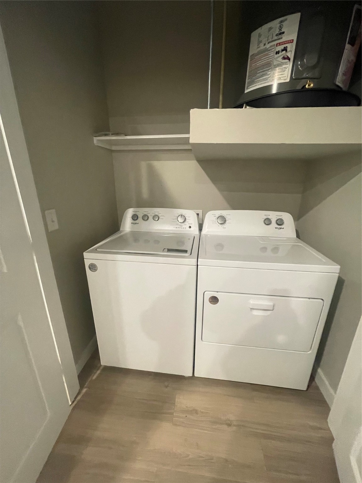 20525 Ella Boulevard, Unit 4211 Spring, TX 77388 - Photo 5 of 7 a utility room with dryer and washer