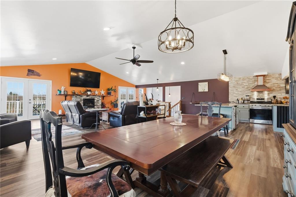27 Bock Lane Baden, PA 15005 - Photo 17 of 50 a view of a dining room with furniture a chandelier and wooden floor