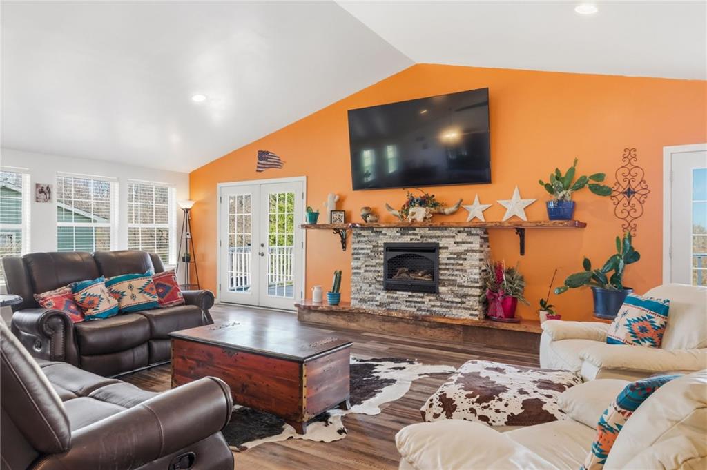 27 Bock Lane Baden, PA 15005 - Photo 20 of 50 a living room with furniture and a flat screen tv