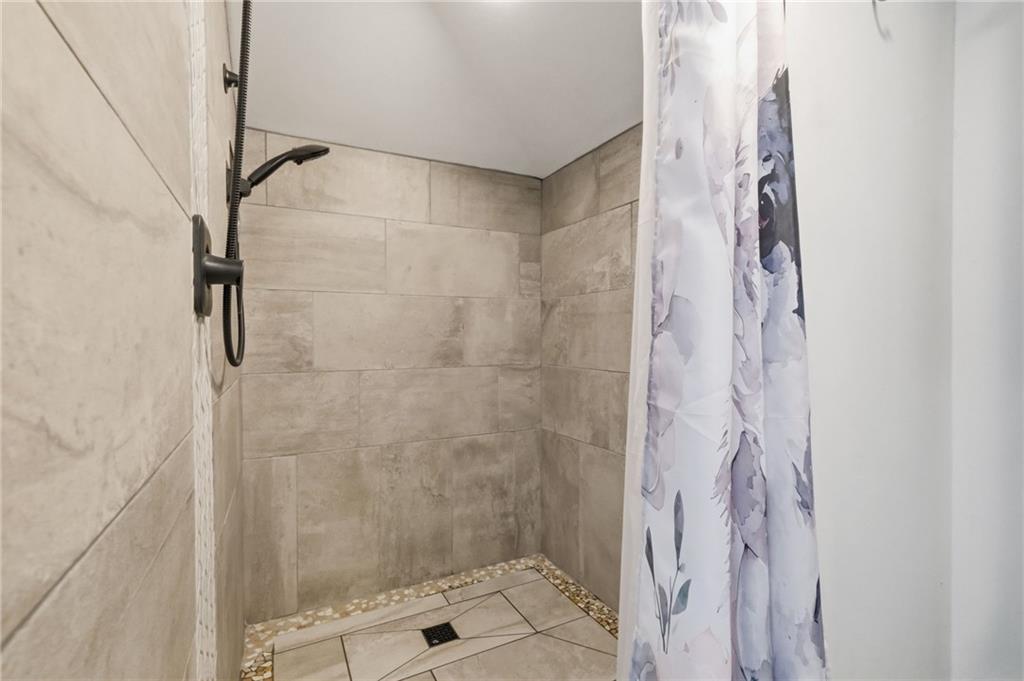 27 Bock Lane Baden, PA 15005 - Photo 34 of 50 a bathroom with a shower