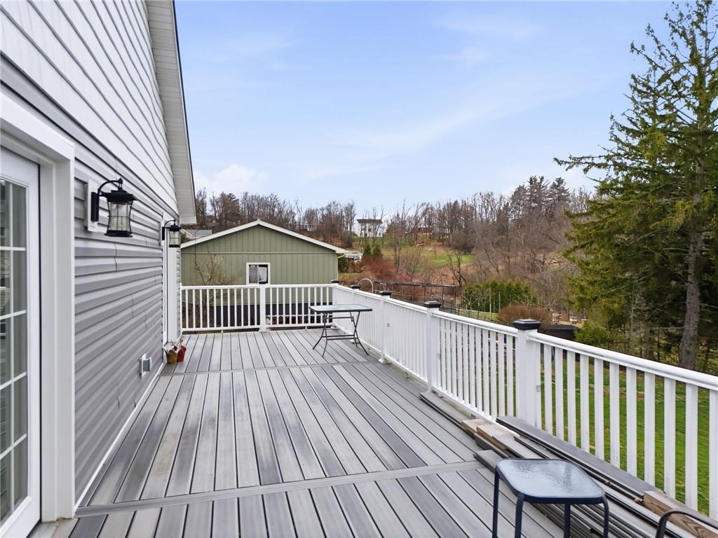 27 Bock Lane Baden, PA 15005 - Photo 46 of 50 a view of a wooden deck with a yard