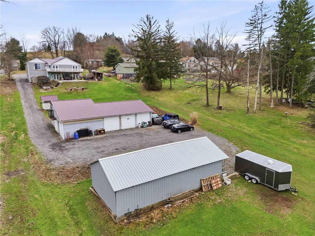 27 Bock Lane Baden, PA 15005 - Photo 48 of 50 an aerial view of a house with a yard basket ball court and outdoor seating