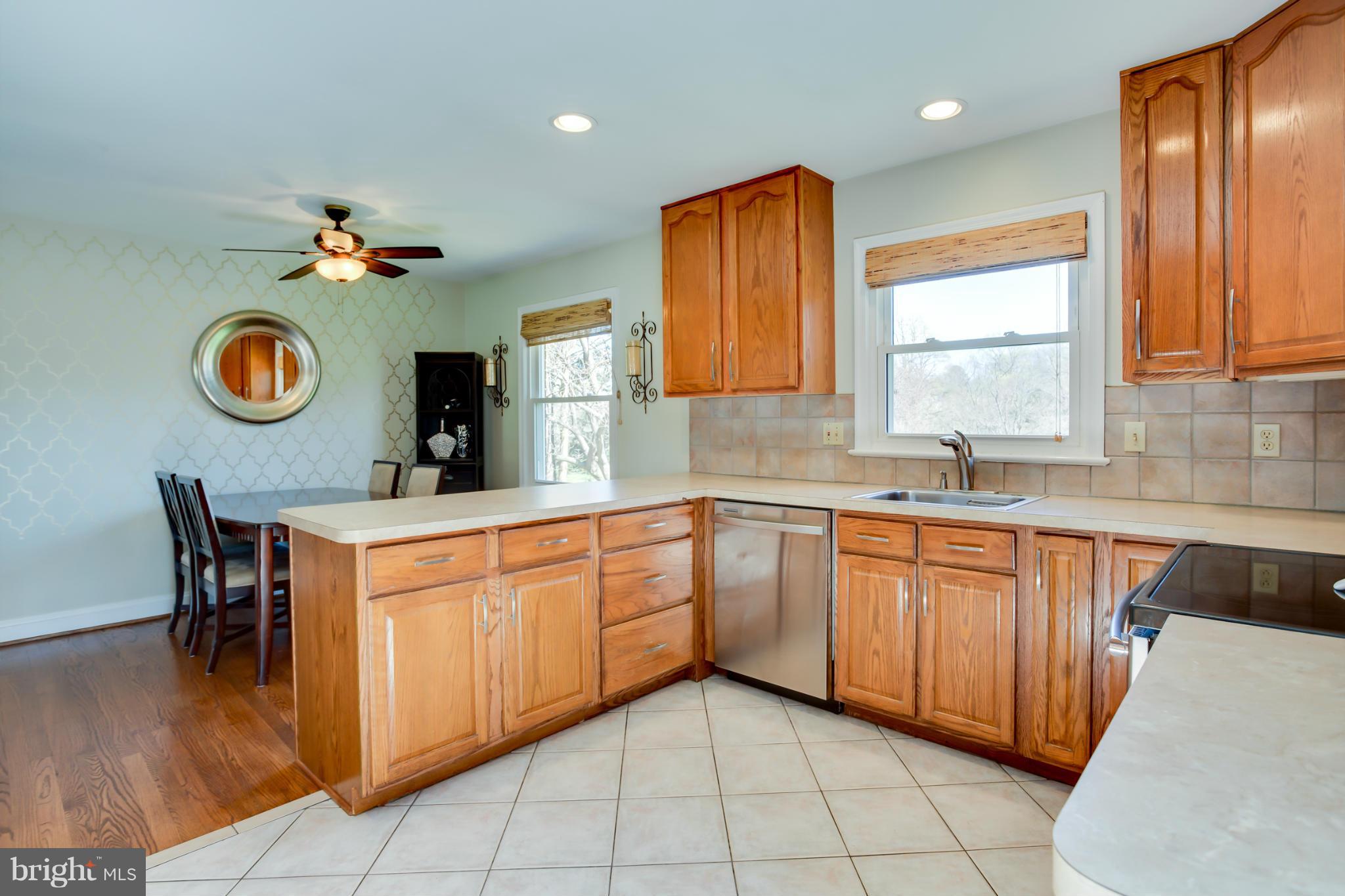 20813 Brooke Knolls Road Gaithersburg, MD 20882 - Photo 5 of 27 Kitchen with view of backyard from window