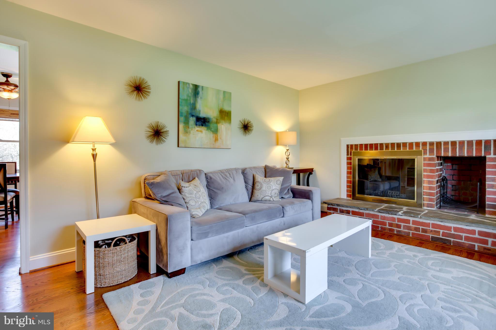 20813 Brooke Knolls Road Gaithersburg, MD 20882 - Photo 8 of 27 Living Room with cozy fireplace