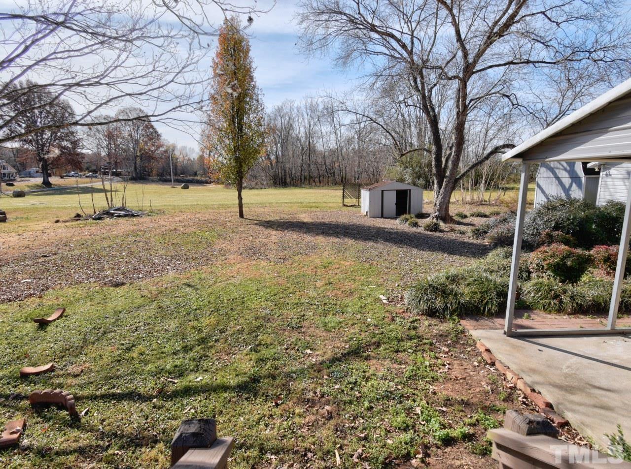 810 Dink Ashley Road Timberlake, NC 27583 - Photo 23 of 31 a view of yard with tree