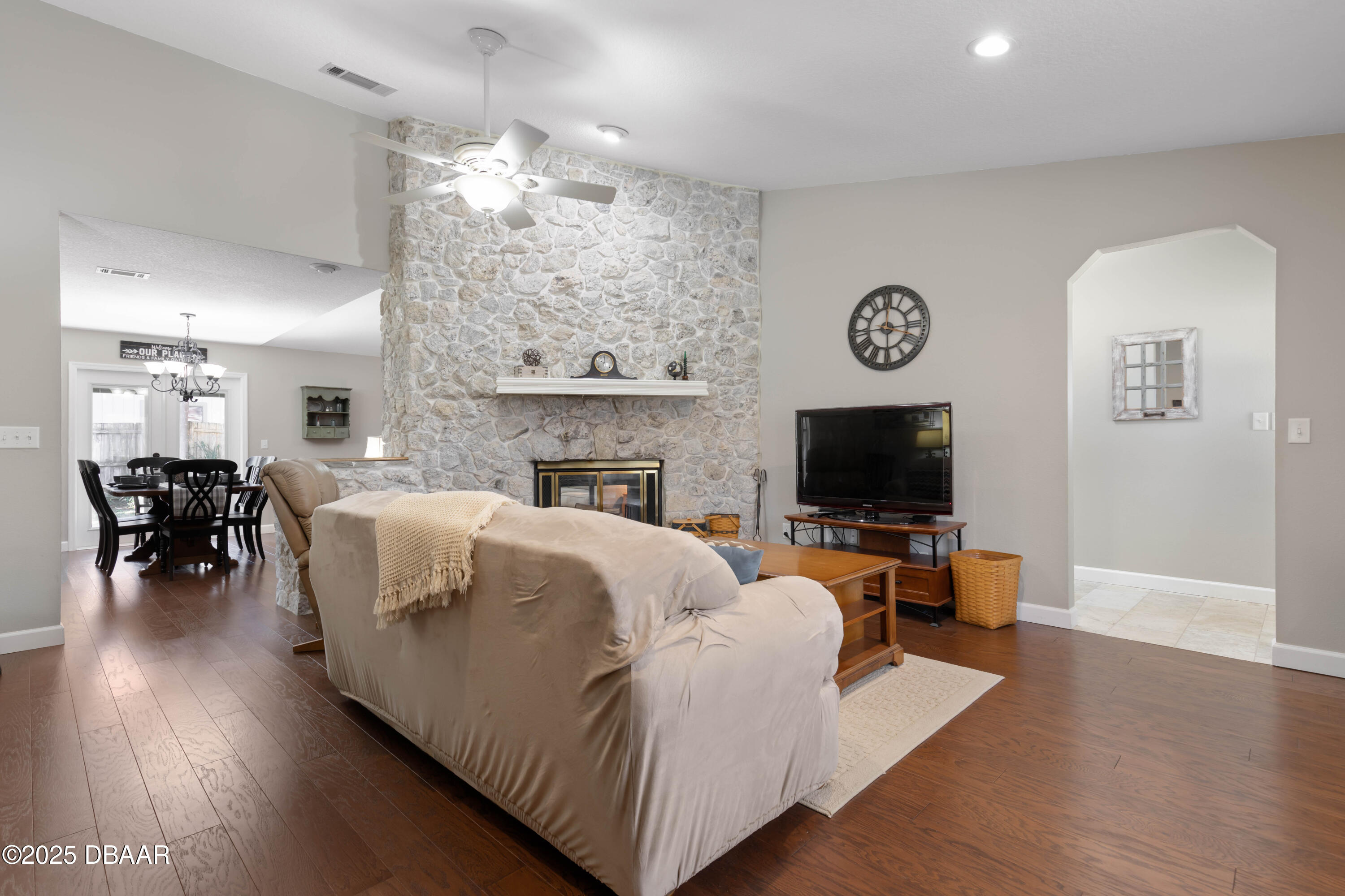 792 Victoria Circle East Ormond Beach, FL 32174 - Photo 7 of 53 a living room with furniture and a flat screen tv