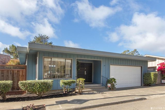 a view of a house with a patio